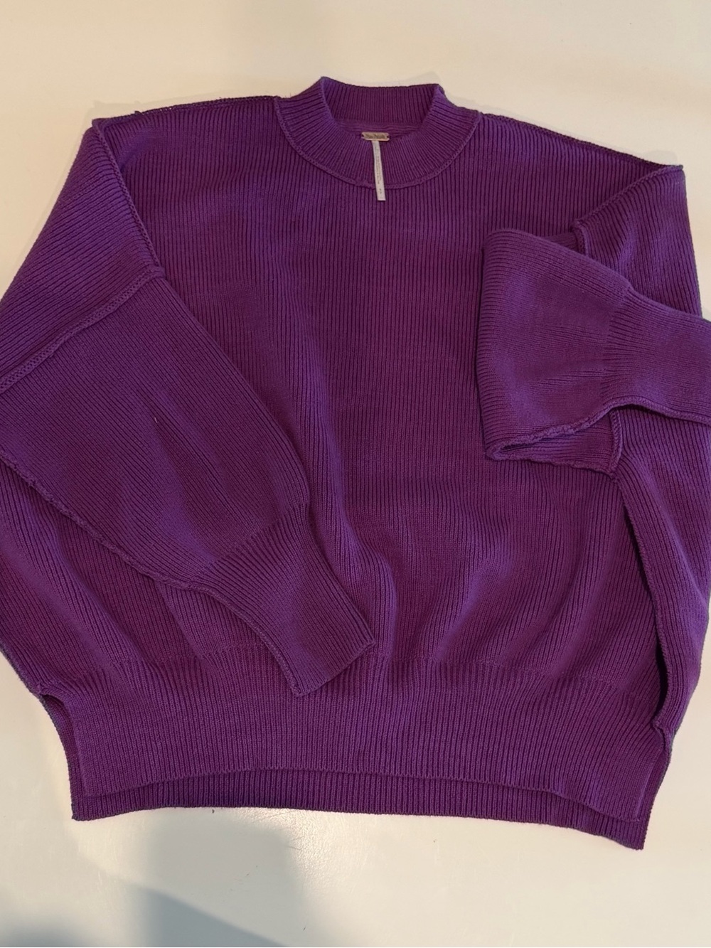 Free People oversized ribbed knit sweater in size small. NWOT.